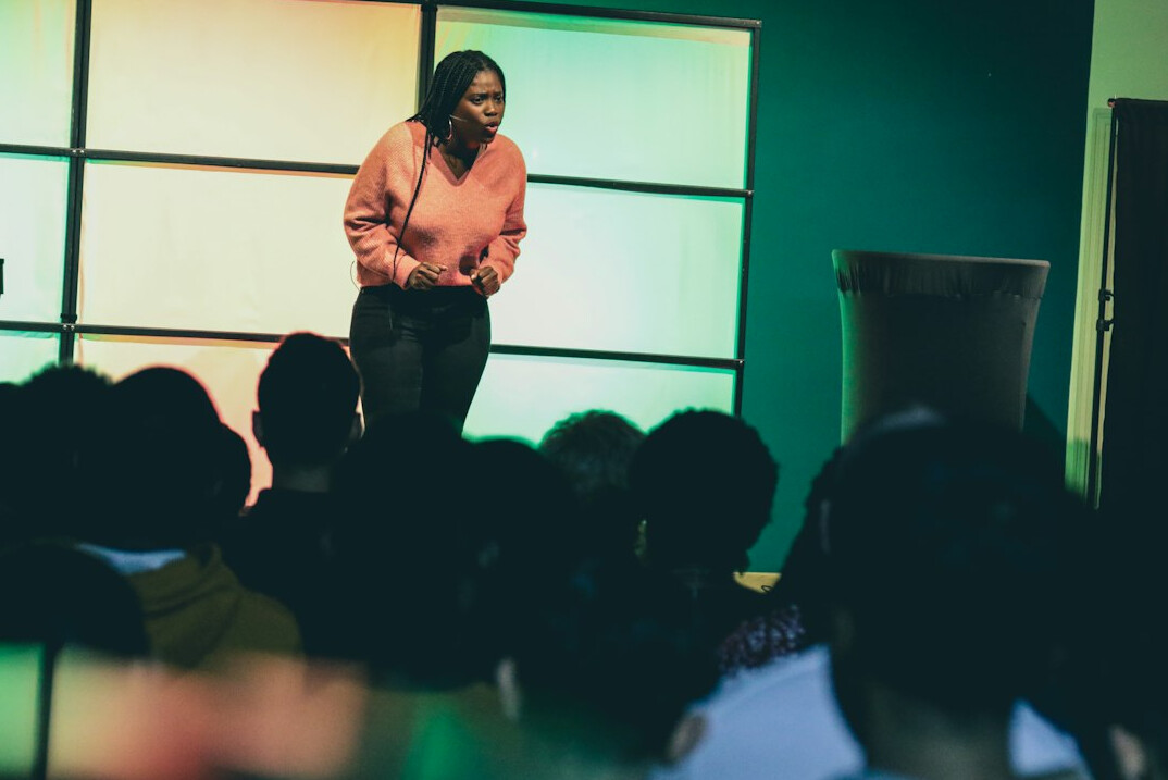 confident speaker presenting ideas
