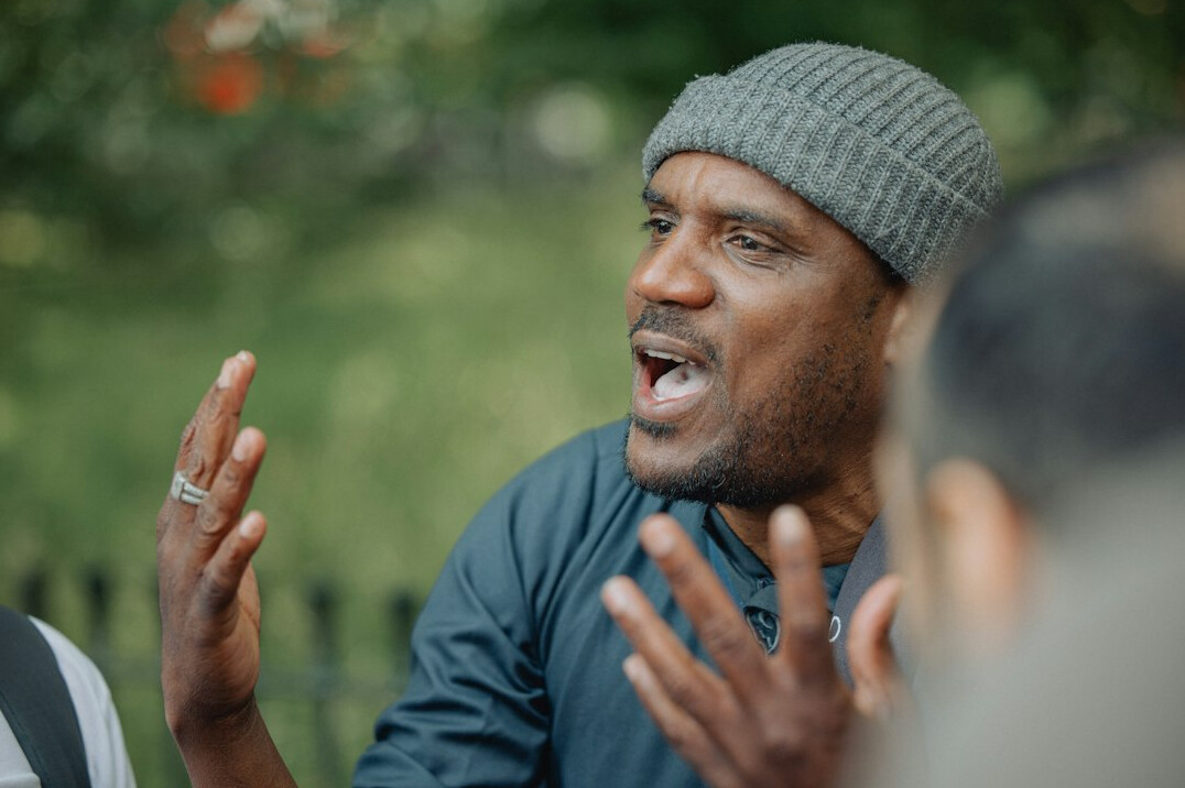 person gesturing during conversation