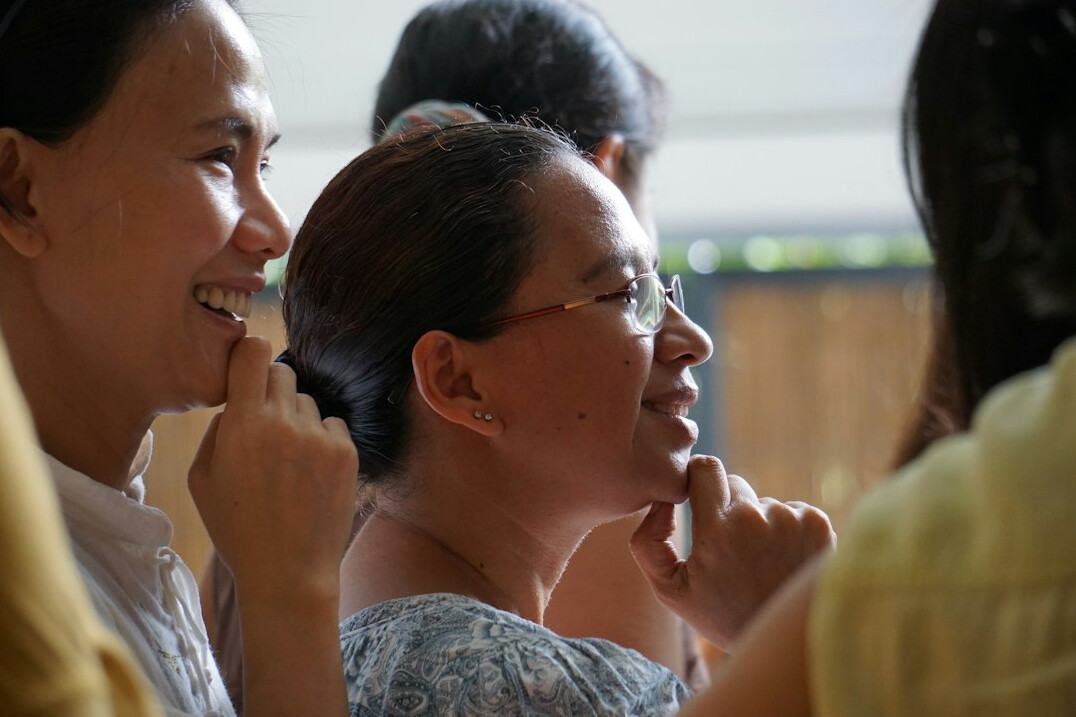 woman leading group discussion