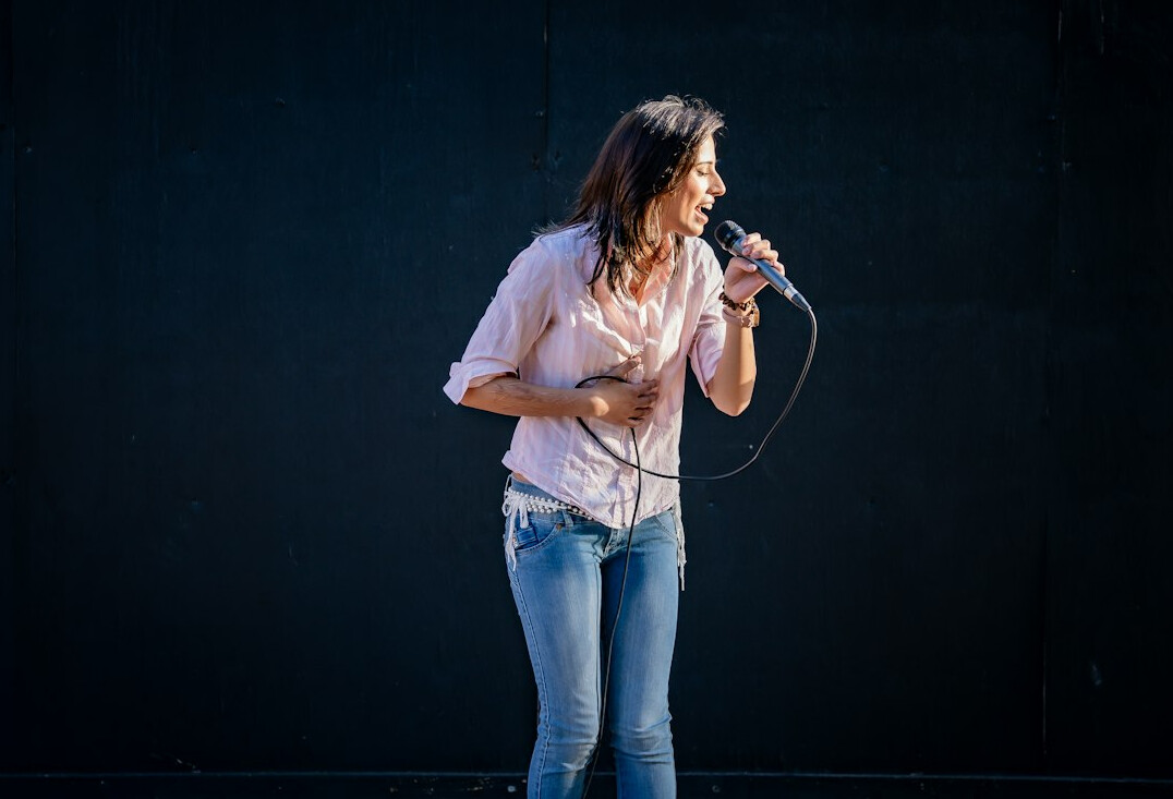 person speaking confidently on stage